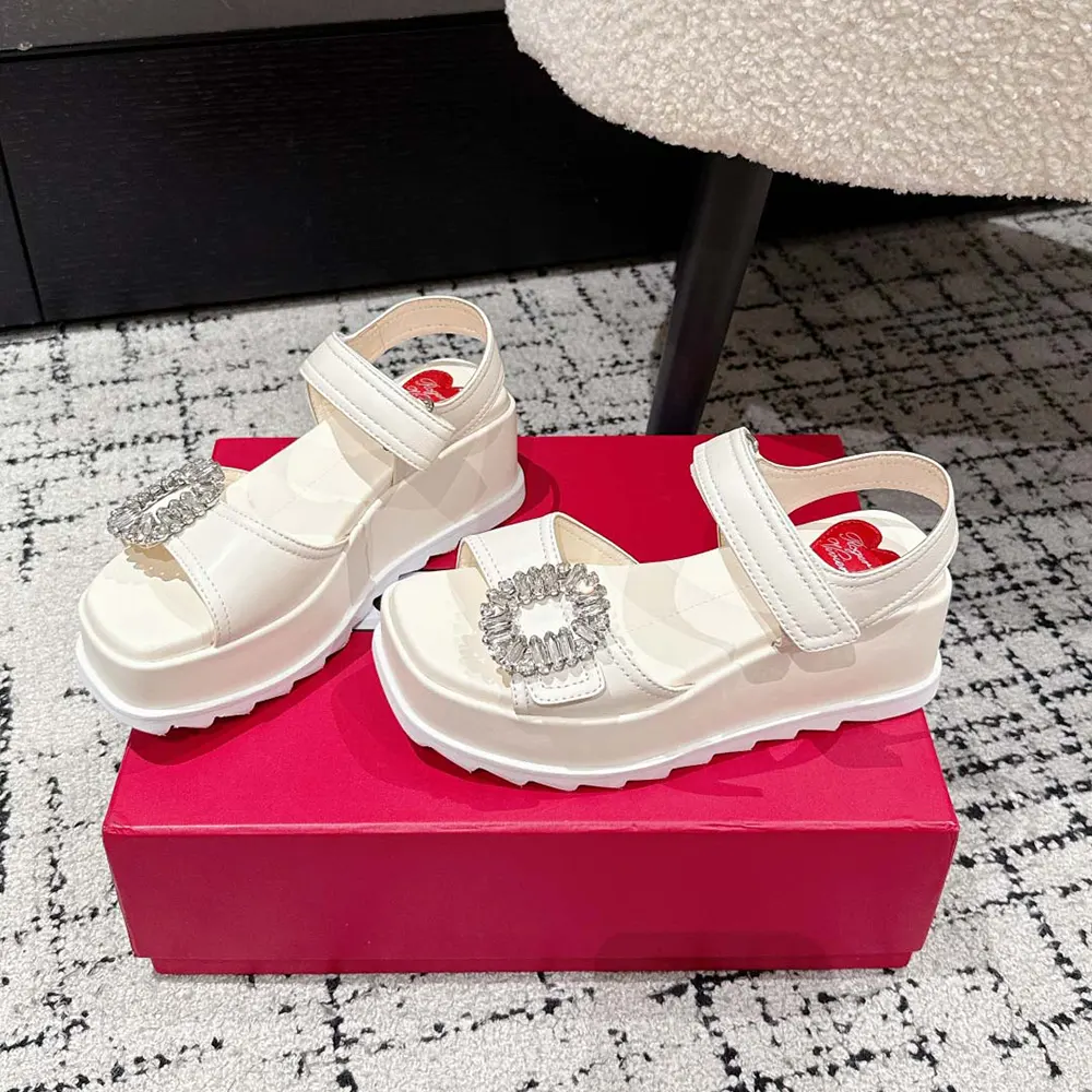 Top view showcasing white leather and wedge heel of Roger Vivier Women Slidy Viv’ Wedge Sandals