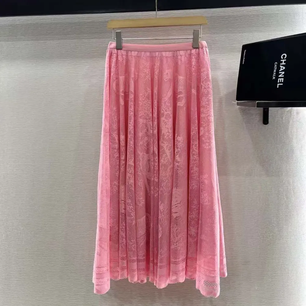 Side angle showcasing flare and flow of Dior Women Dioriviera Skirt pink