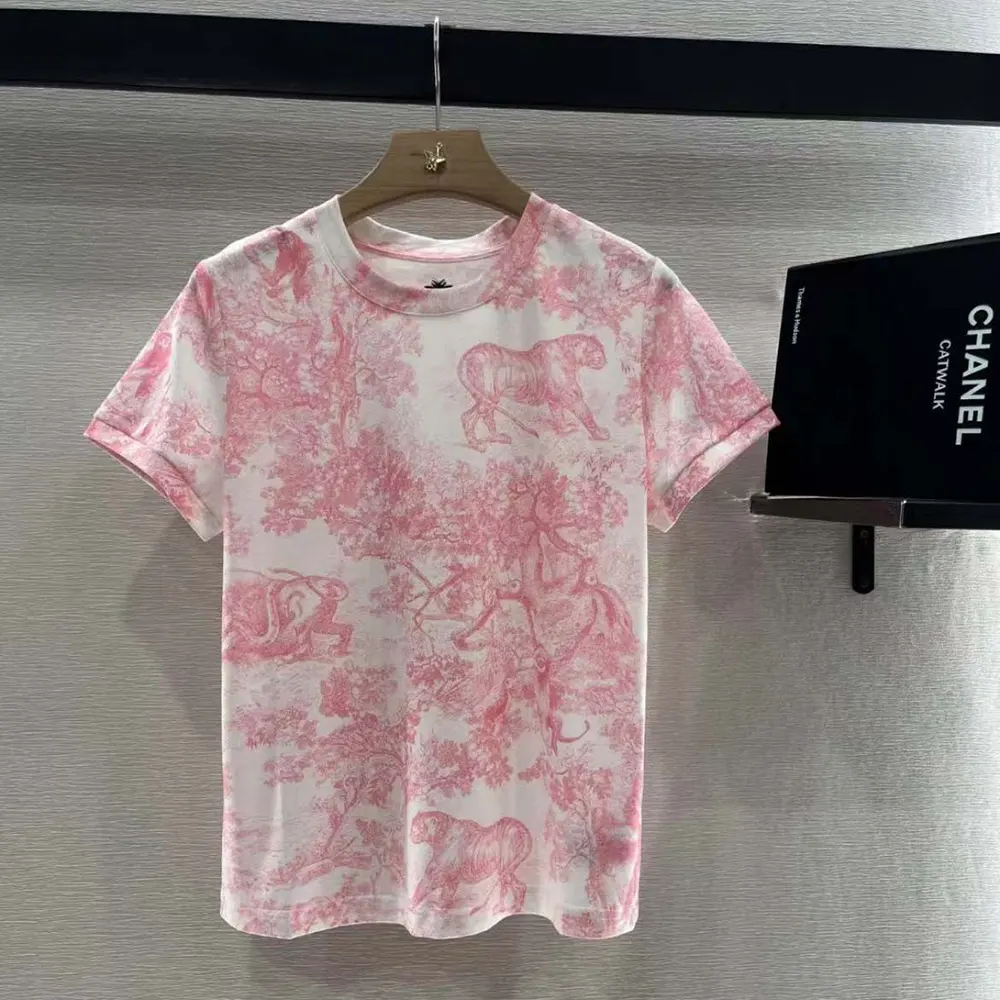 Close-up detail of Dior Riviera logo embroidery on t-shirt