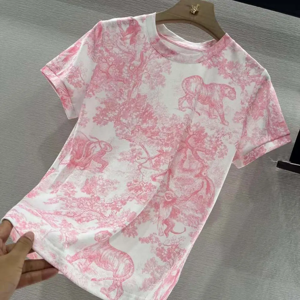 Side angle showing relaxed fit of Dior Women Dioriviera T-Shirt