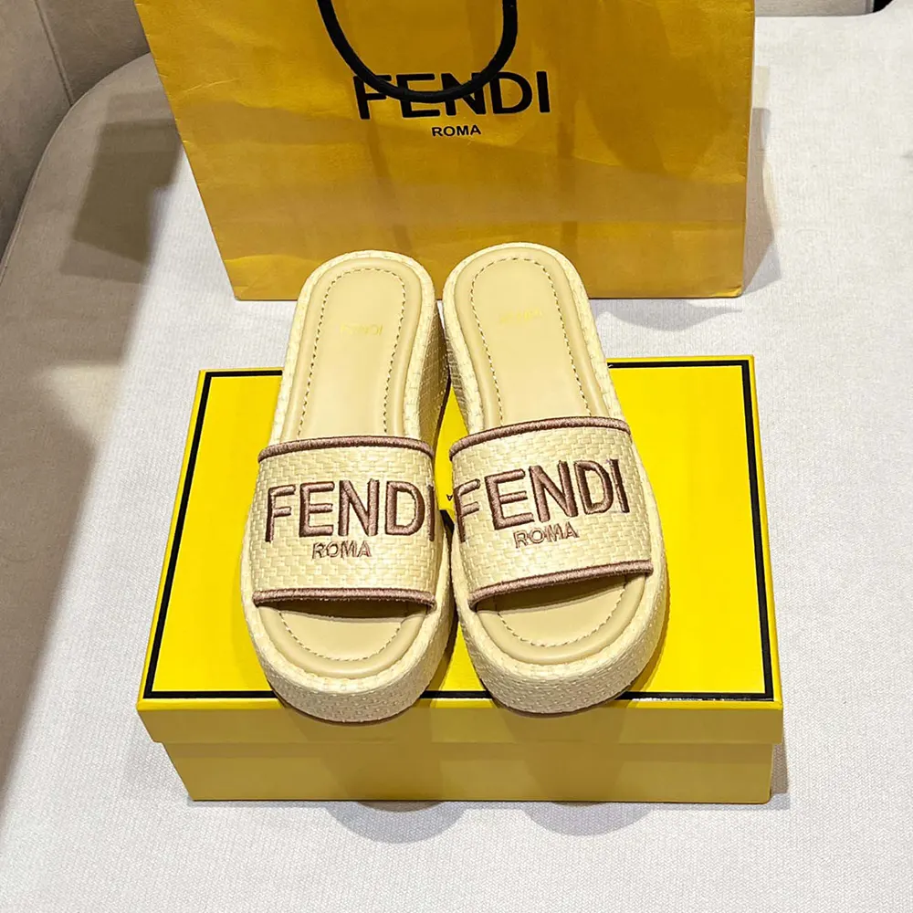 Top view showing beige flatform silhouette of Fendi slides