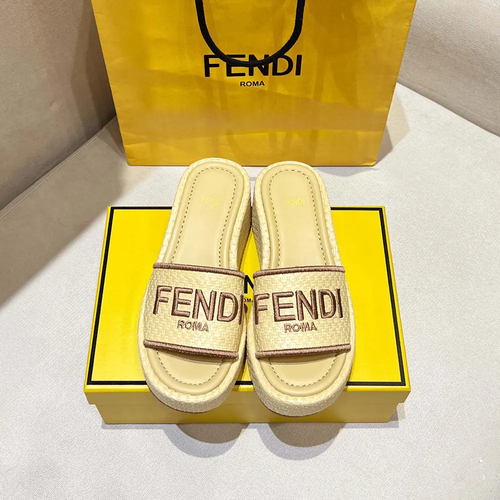 Close-up of natural raffia texture on Fendi Sunshine slides