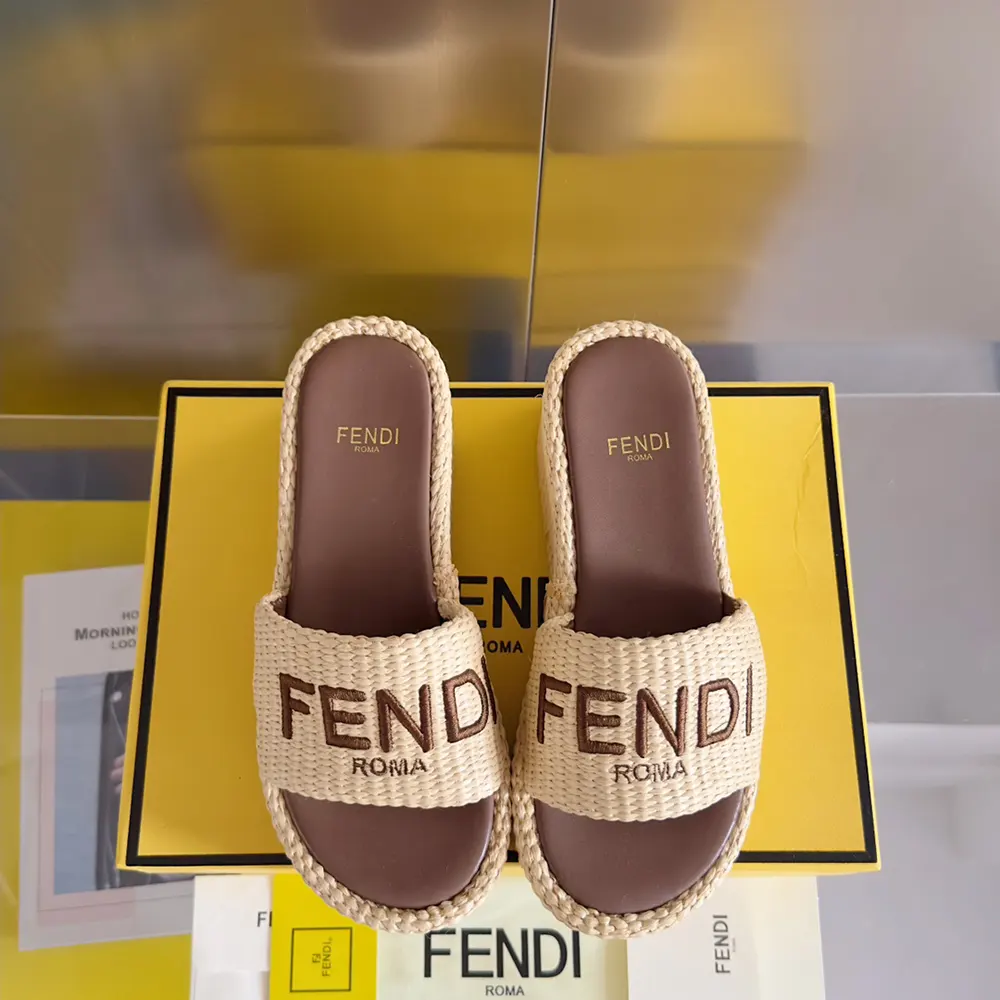 Top angle showing natural raffia texture on Fendi Sunshine slides