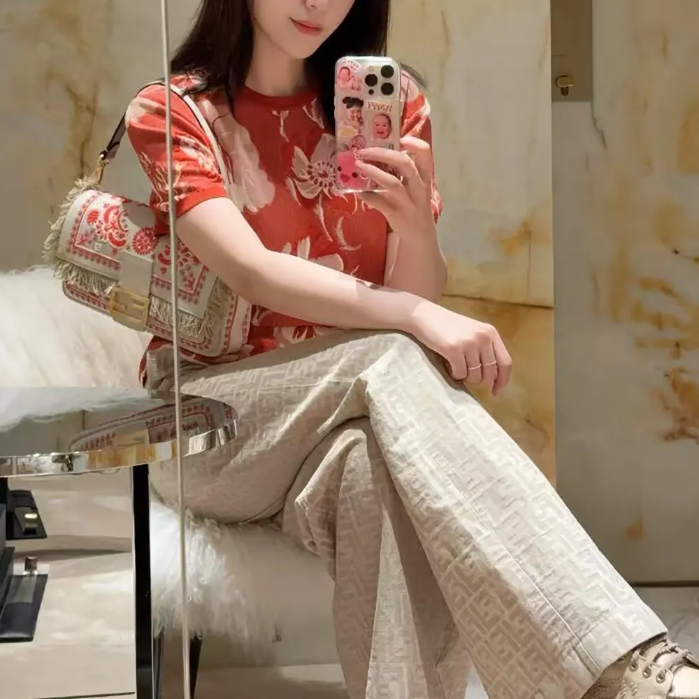 Side profile of Fendi Women Red Viscose Jacquard T-shirt highlighting relaxed fit