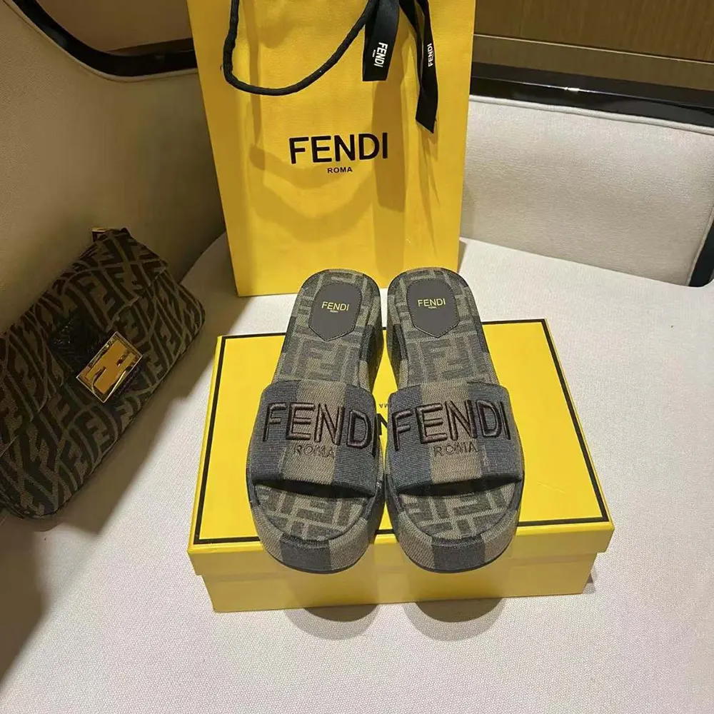 Close-up detail of fabric upper and logo on Fendi Women Sunshine Brown Slides