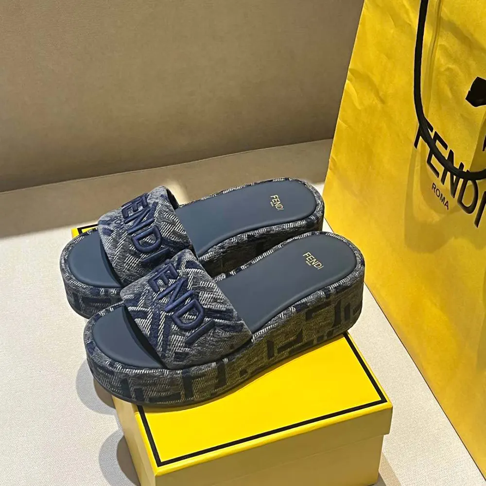 Close-up of gold-tone FF logo hardware on Fendi Women Sunshine sandals