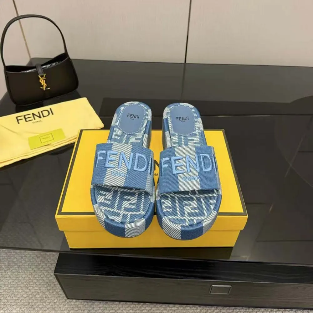 Close-up detail of denim-effect jacquard fabric on Fendi flatform slides