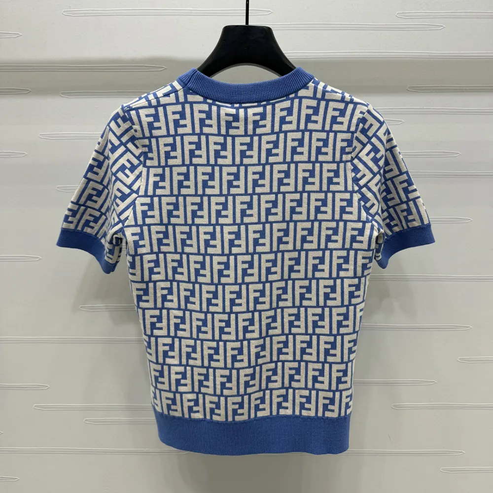 Side angle showing relaxed fit of Fendi Women Sweater Blue FF Cotton Jumper