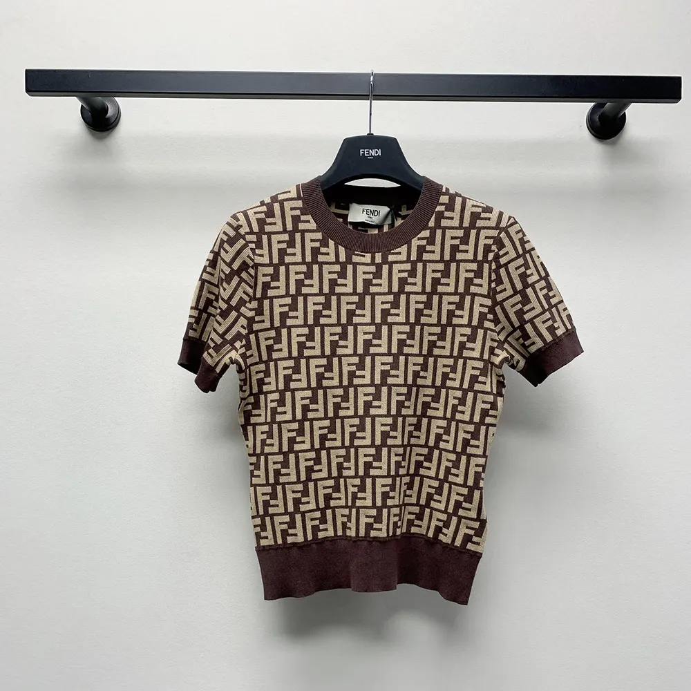 Close-up of Fendi Women Sweater Brown FF Cotton knit texture and cuffs