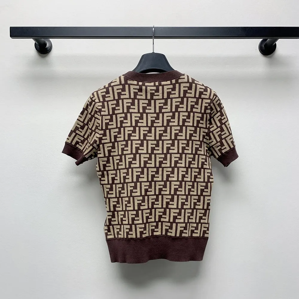 Side angle of Fendi Women Sweater Brown FF Cotton on mannequin