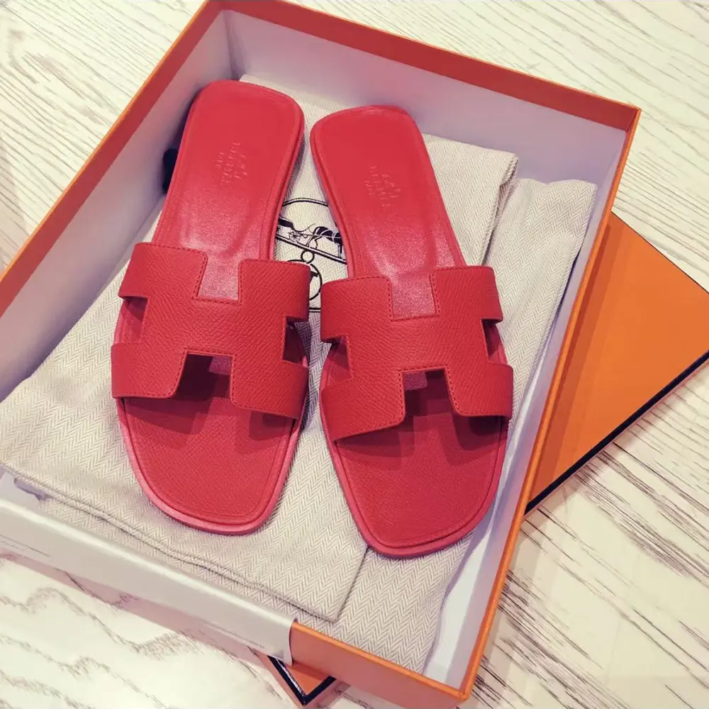 Top view of Hermes Women Oran Sandal-Red highlighting open silhouette