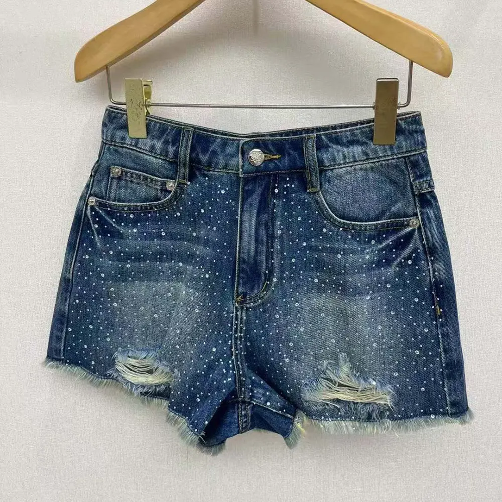 Front view of Loewe Women Anagram Shorts in Denim showing blue colour