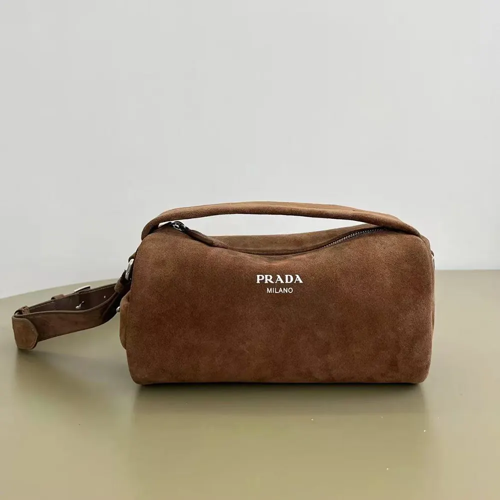 Close-up detail of coffee suede texture on Prada Unisex Shoulder Bag