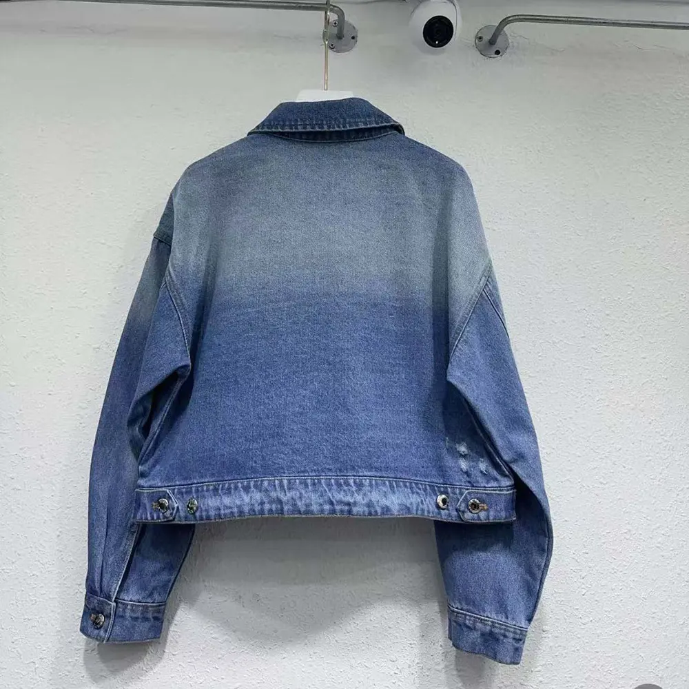 Side angle showing cropped silhouette of Prada Women Cropped Organic Denim Jacket
