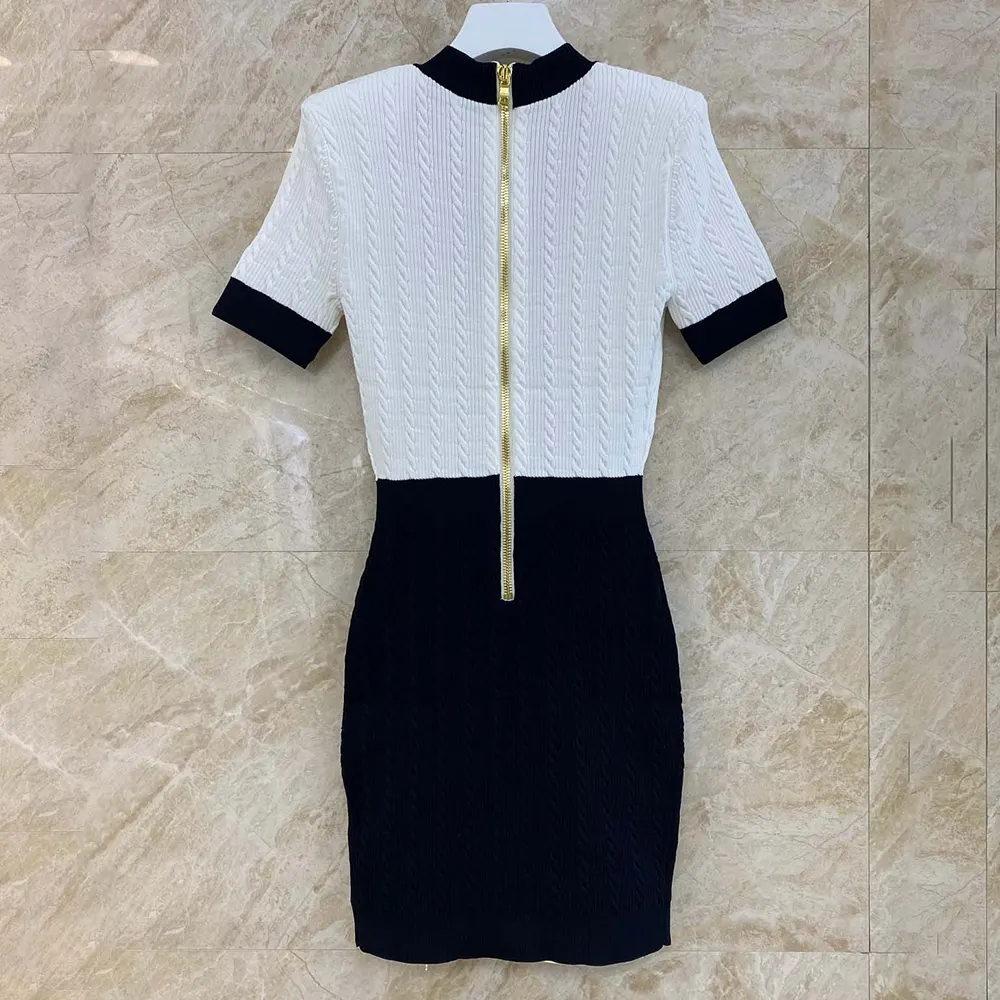 Side profile showcasing silhouette of Balmain Women Two-Tone Cable-Knit Bodycon Dress