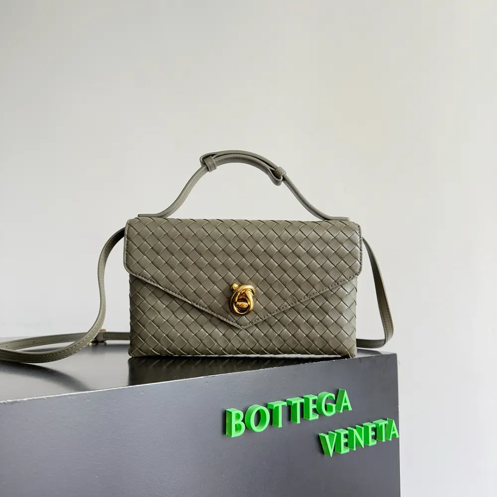 Side angle showing intrecciato weaving on Bottega Veneta Women Knot Lock bag