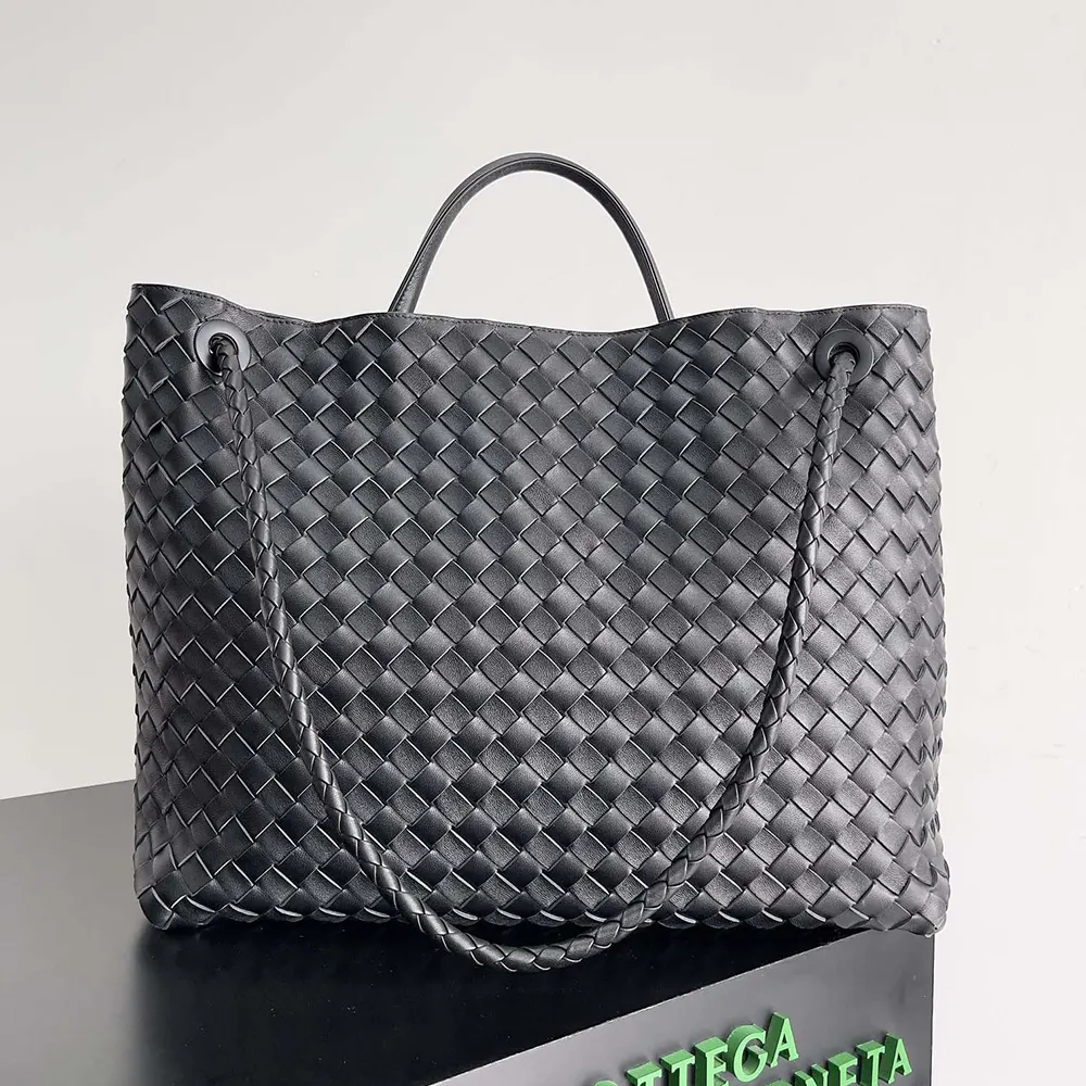 Side view showing silhouette of Bottega Veneta Women Large Andiamo lambskin shoulder bag