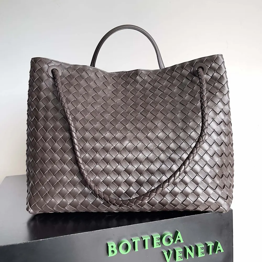 Side profile showing silhouette and flap closure of Bottega Veneta bag