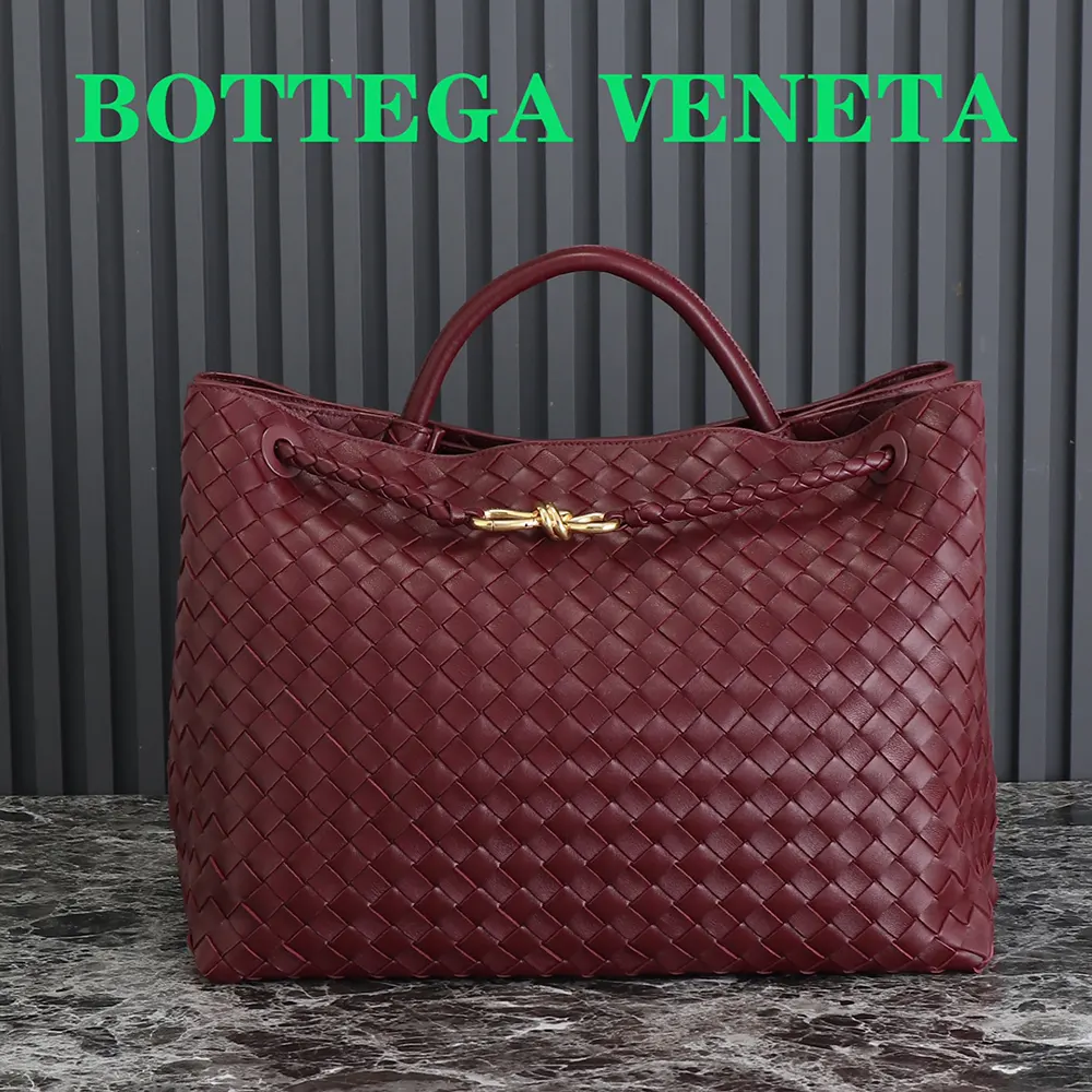 Close-up of intrecciato weave and maroon lambskin on Large Andiamo bag