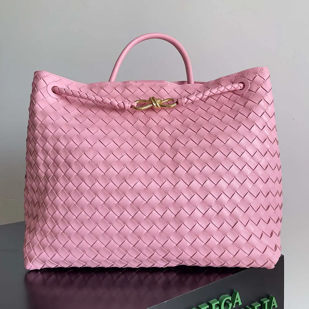 Close-up detail of gold hardware and woven design on the Bottega Veneta Women Large Andiamo