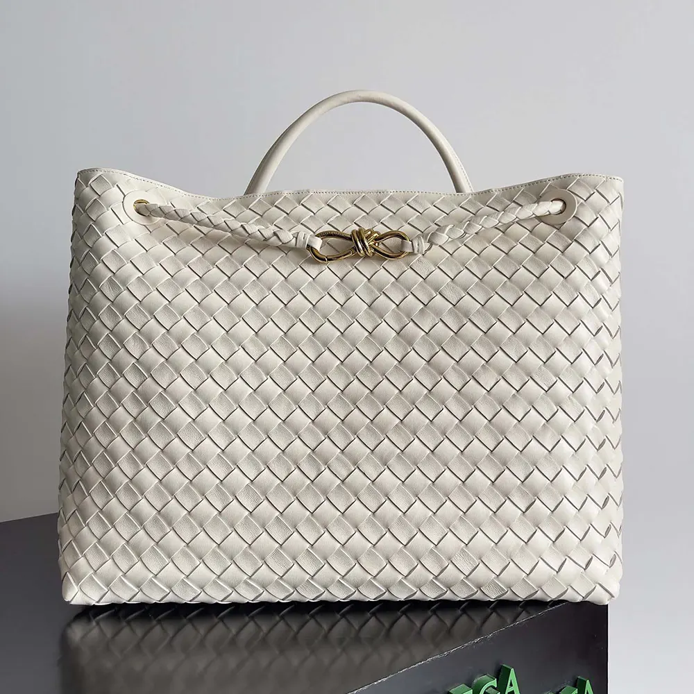 Close-up detail of gold-tone hardware on Bottega Veneta Women Large Andiamo White bag