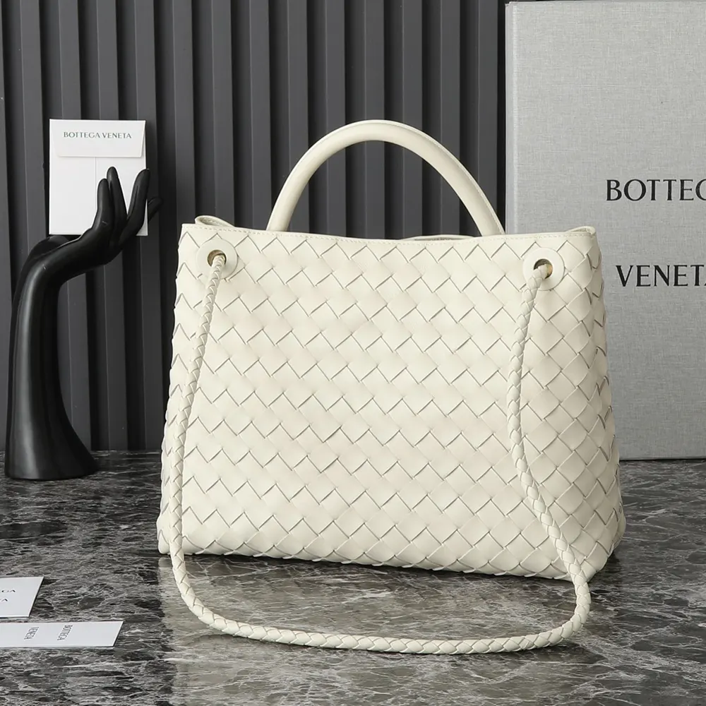 Side profile showing polished hardware and strap on Bottega Veneta bag
