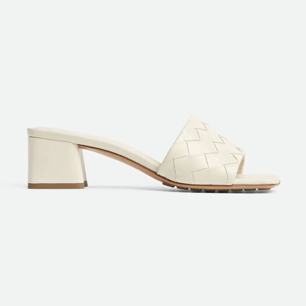 Side angle of Bottega Veneta Women Parco Mule-White showing woven leather detail