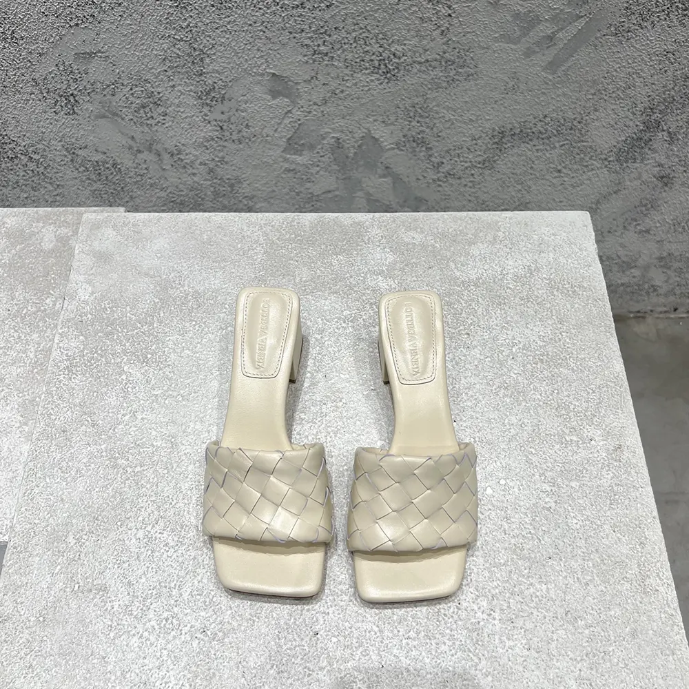 Close-up of the white leather and tonal stitching on Bottega Veneta Parco Mule
