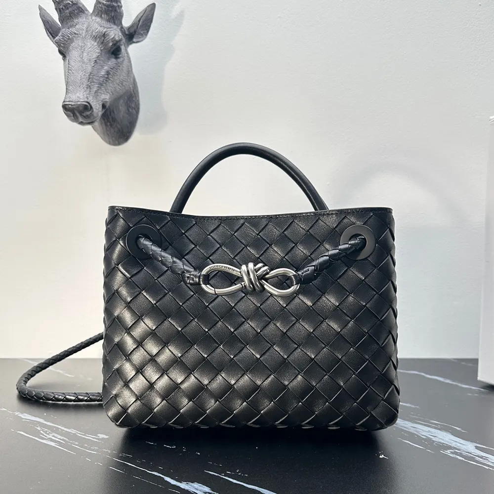 Close-up of intrecciato woven leather and silver hardware detail on Bottega Veneta bag