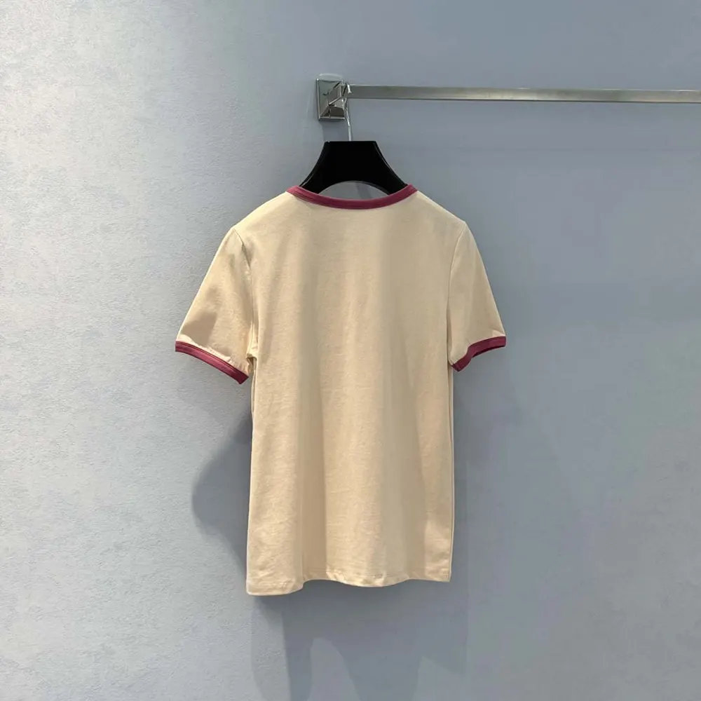 Side angle showing relaxed fit of Celine Women 70’S T-Shirt In Cotton Jersey