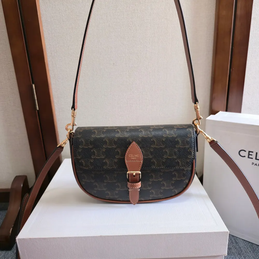 Close-up of gold-tone hardware on Celine Women Folco Shoulder Bag