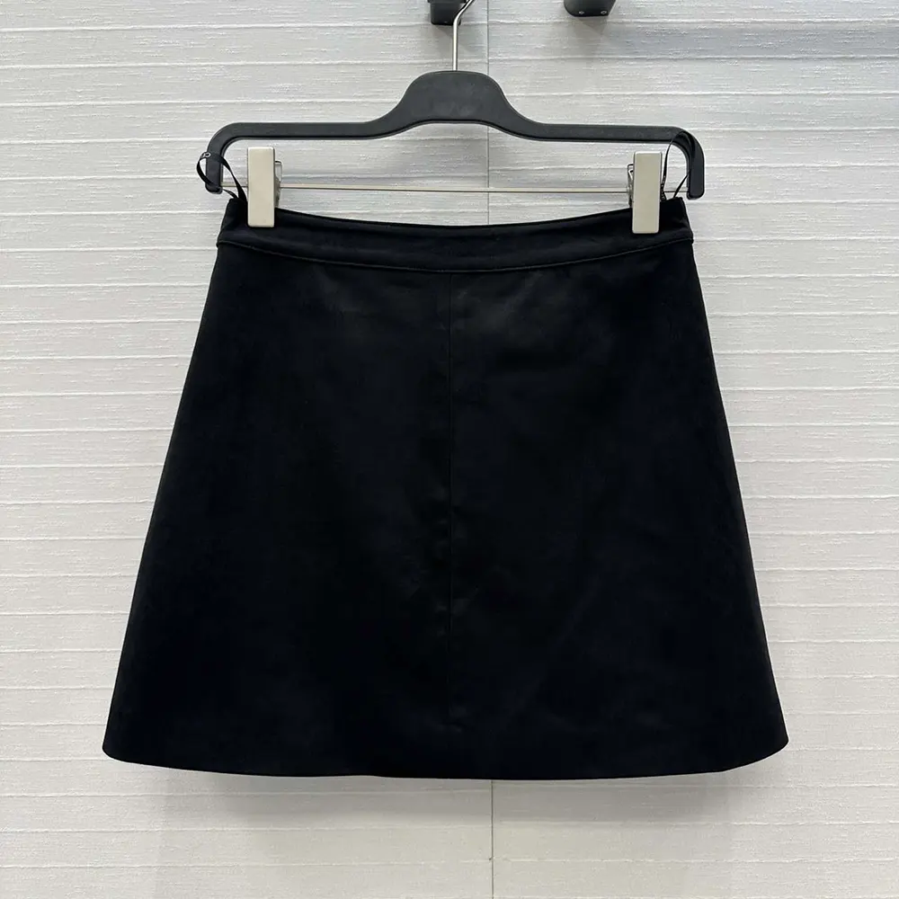 Side profile showing silhouette of Celine Women Mini Skirt In Suede