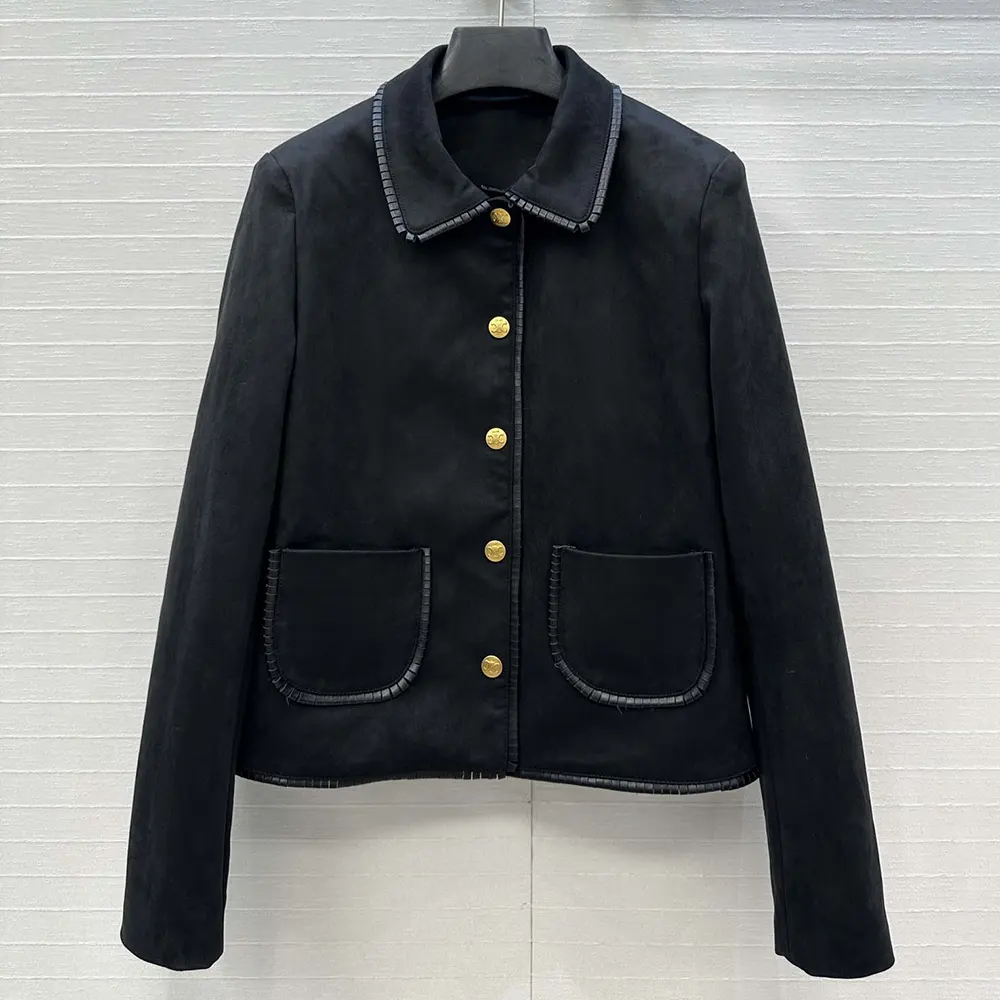 Close-up of black suede texture and zip closure on Celine jacket