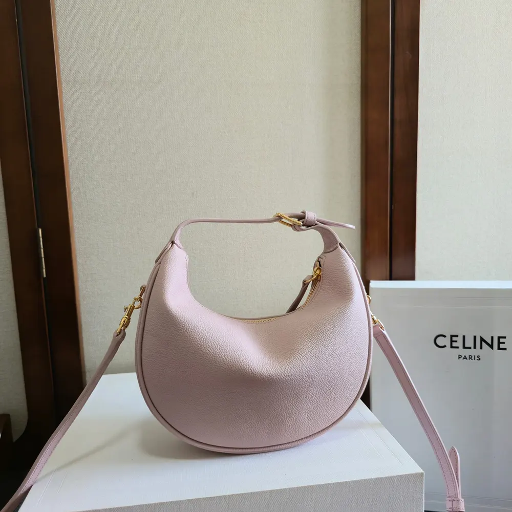 Close-up of gold hardware on Teen Celine Lulu pink shoulder bag