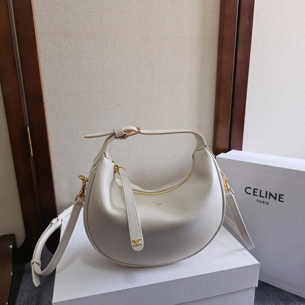 Close-up of gold-tone hardware on Celine Women Teen Celine Lulu bag