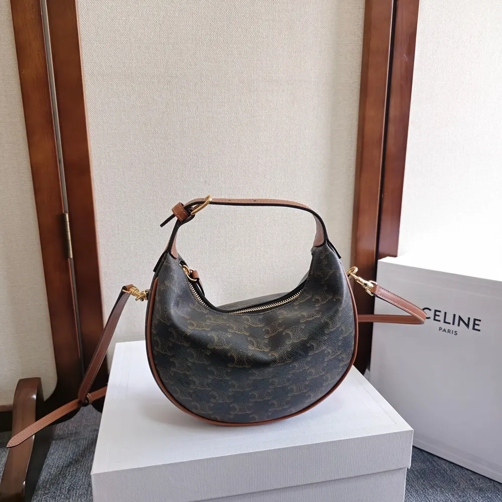 Close-up of gold Triomphe clasp on Celine Women Teen Celine Lulu bag