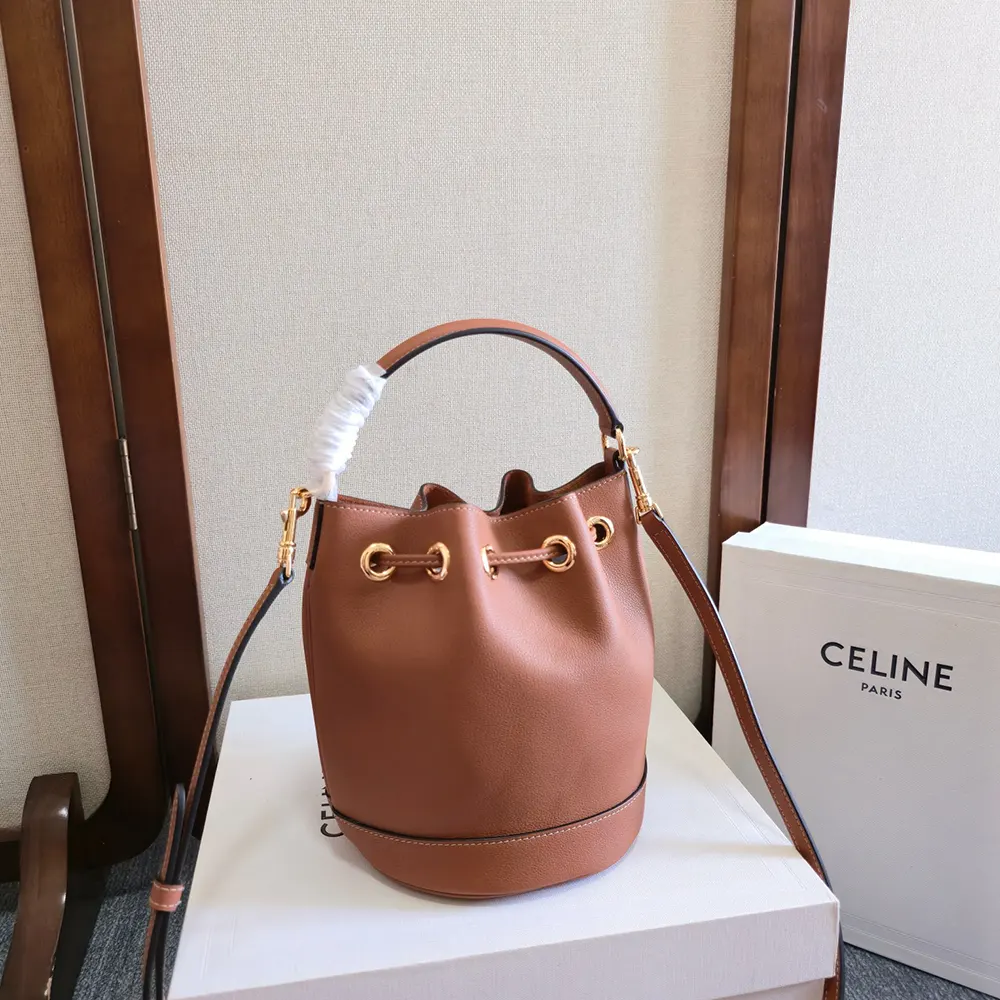 Side profile showing compact silhouette of Celine Women Teen Clara Bag brown