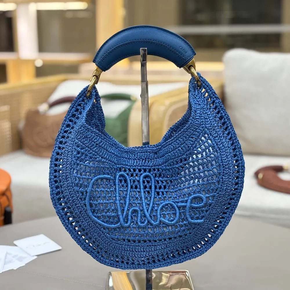 Side angle showing hobo silhouette of Chloe Women Summer Banana Bag