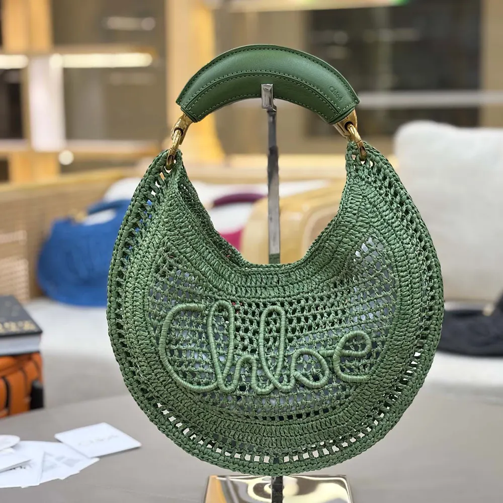 Close-up of gold hardware on Chloe Women Summer Banana Hobo Bag