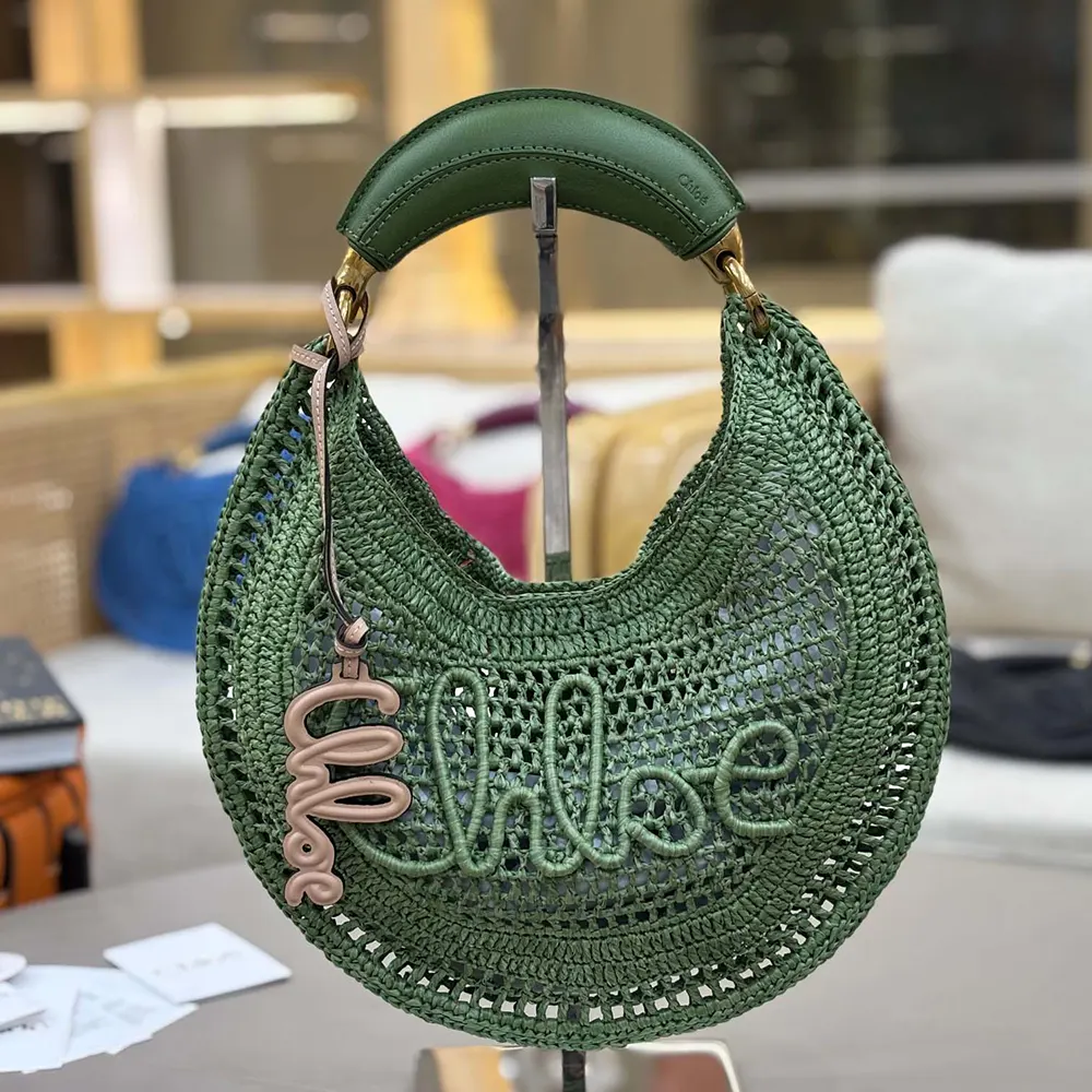 Side profile showing curved silhouette of Chloe Women Summer Banana Hobo Bag