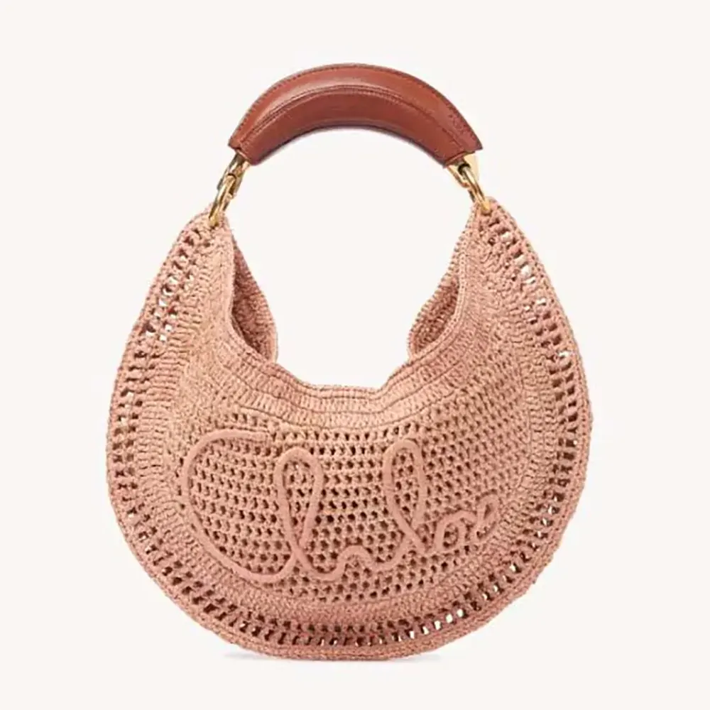 Front view of Chloe Women Summer Banana Hobo Bag In Raffia-Pink with curved silhouette