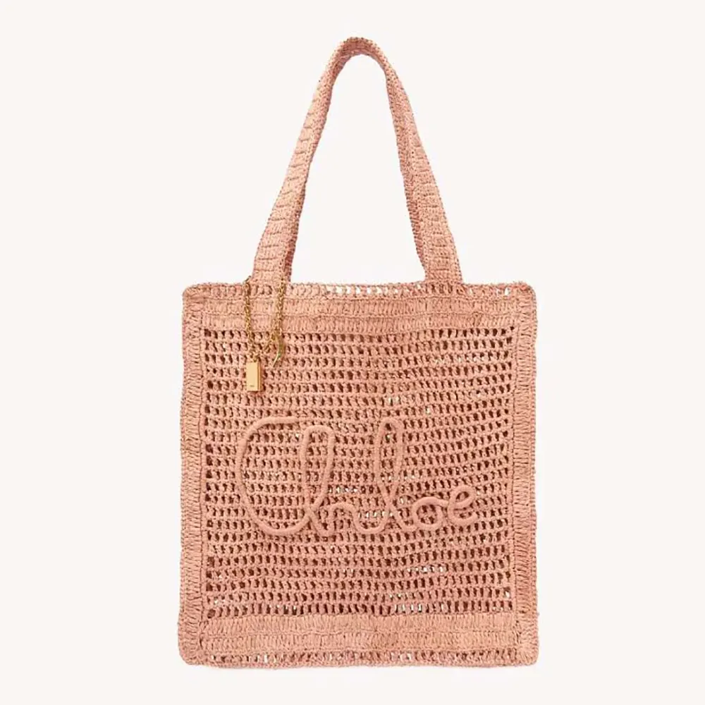 Front view of Chloe Women Summer Banana Tote Bag In Raffia-Pink