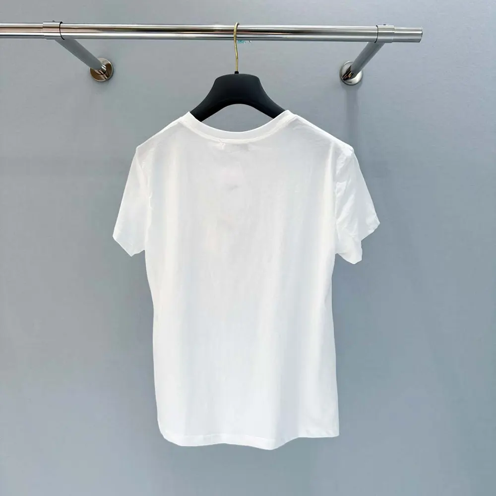 Side angle showing relaxed fit of Dior Women T-Shirt in white cotton-linen
