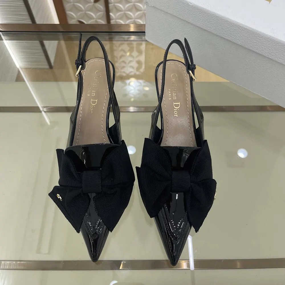 Close-up of silver-tone Dior hardware on Diorissimo Slingback Pump black leather