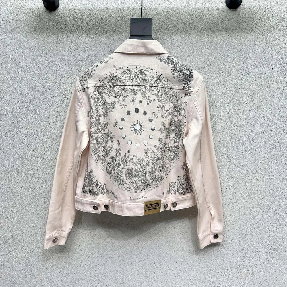 Side profile highlighting silver Dior hardware on women’s denim jacket