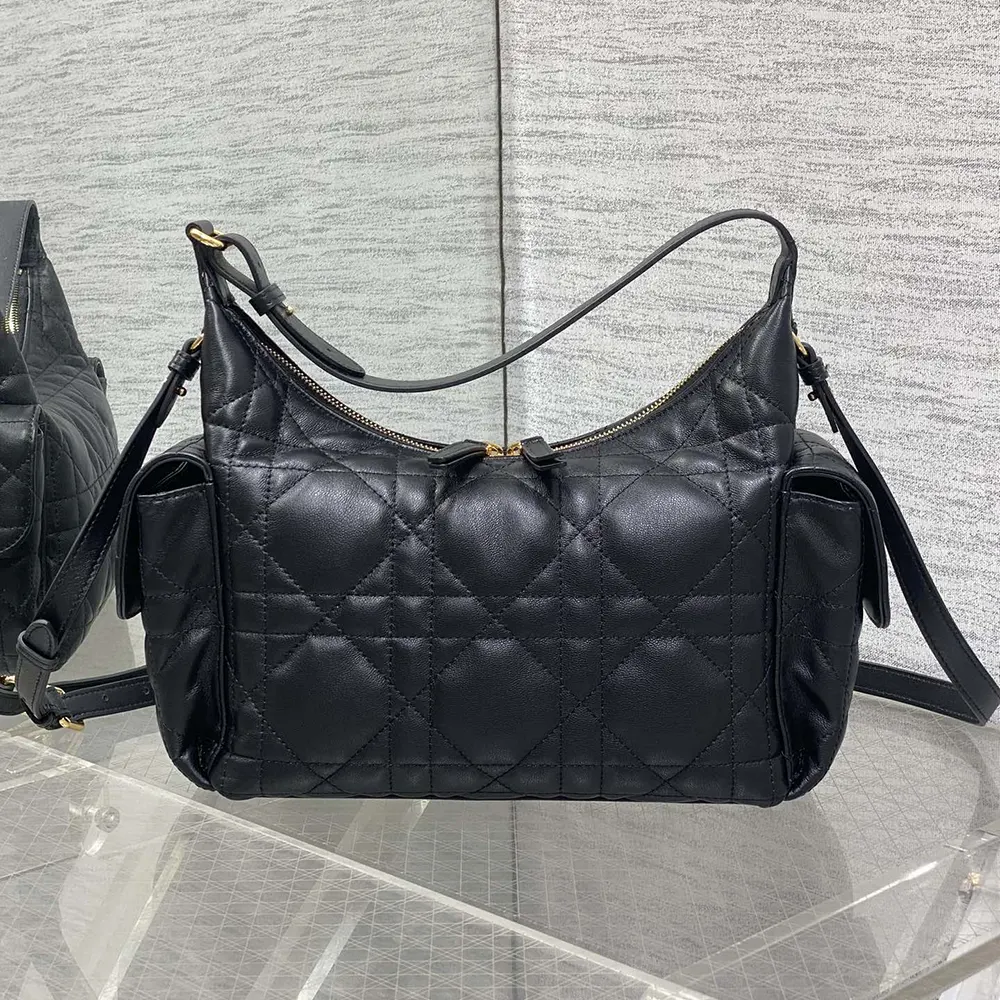 Close-up of silver D-shaped hardware on Dior Women Medium D-Dream Bag