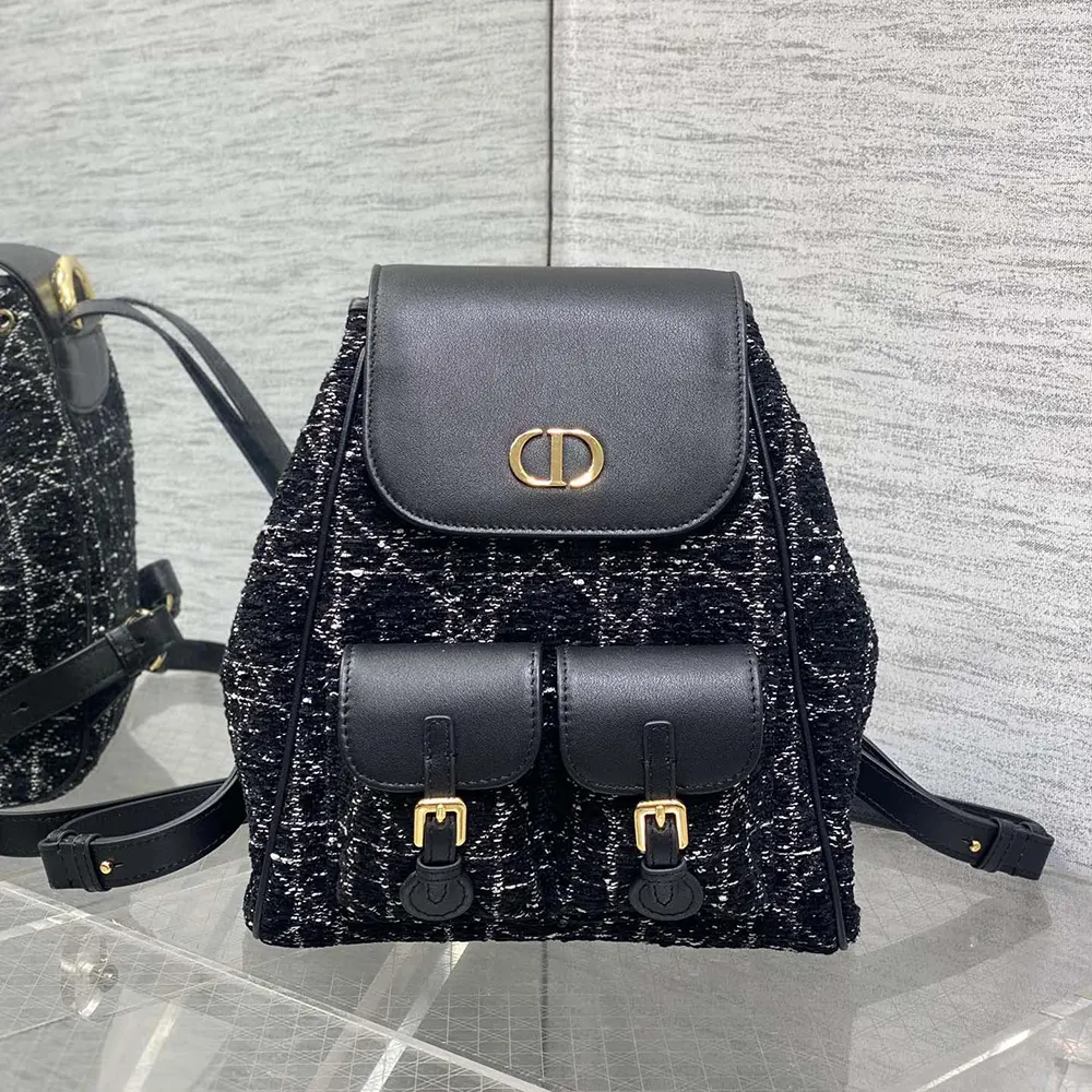 Close-up detail of white cannage motif on Dior Women Medium Dior Caro Backpack