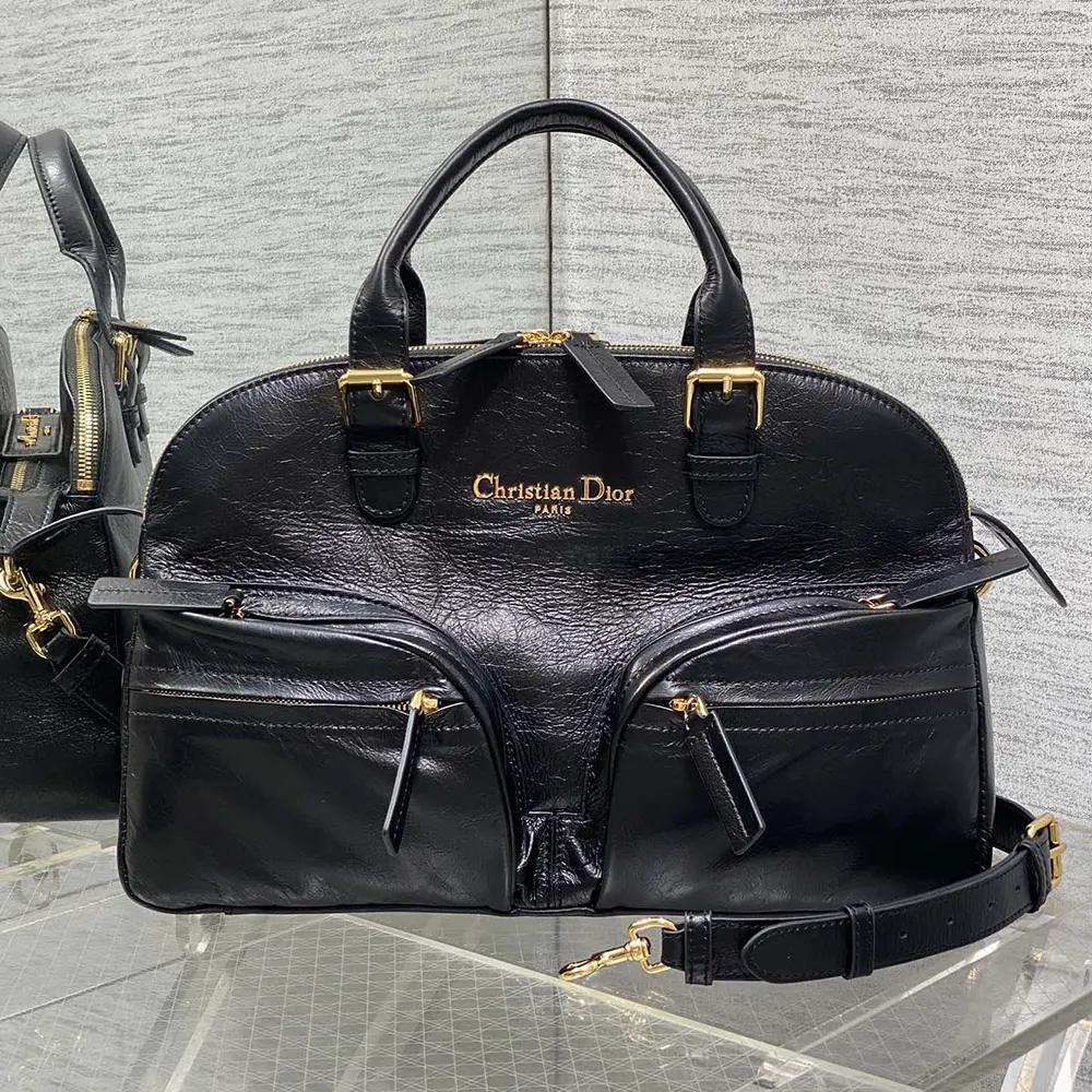 Detailed close-up of crinkled calfskin texture on Dior handbag