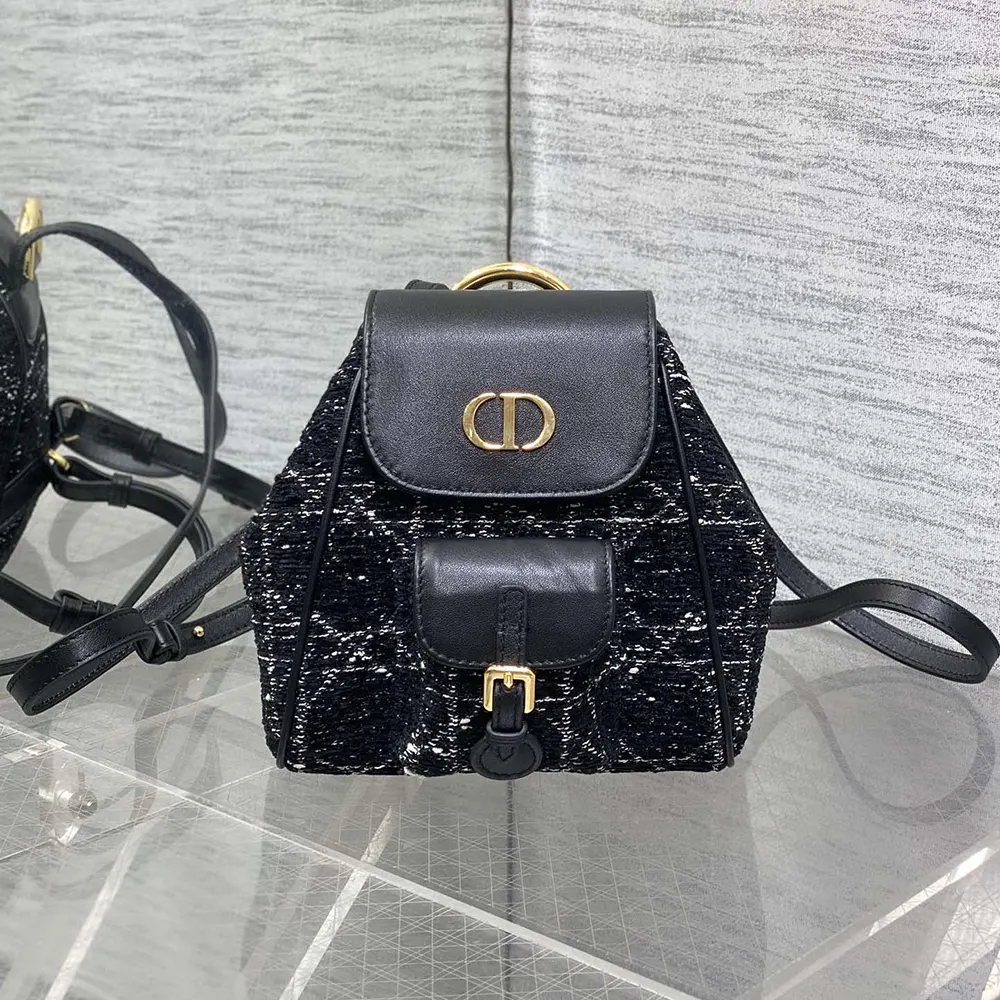 Close-up of white Cannage stitching on Dior Women Small Dior Caro Backpack