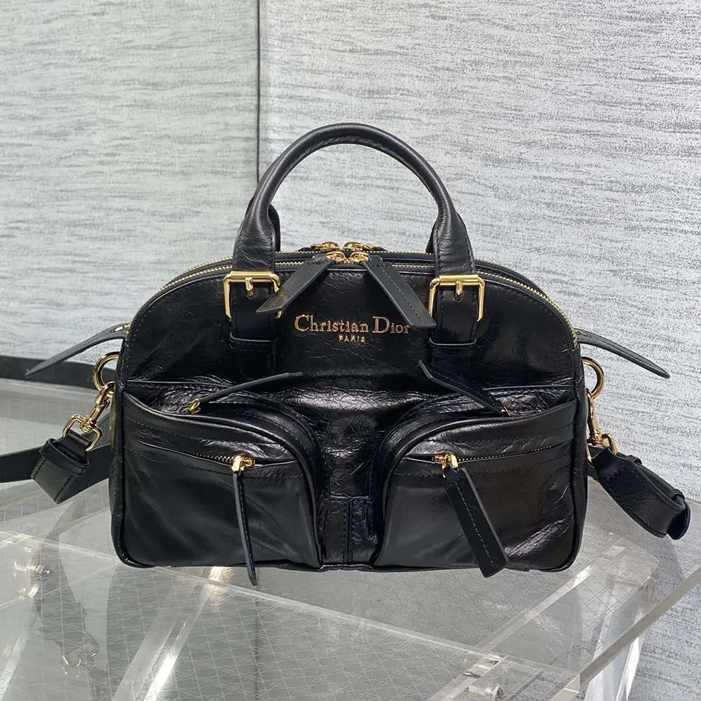 Close-up on silver hardware of Dior Women Small Grand Tour Bowling Bag